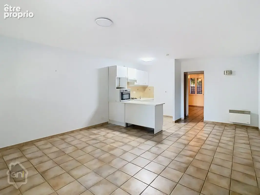 Appartement en rdc - avec parking - photo 7