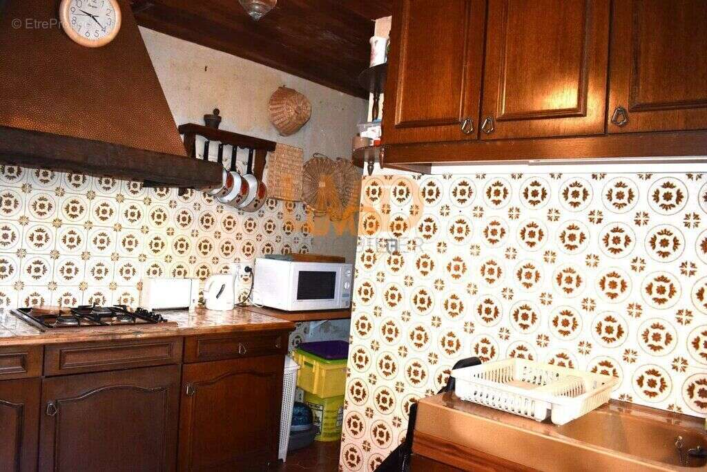 Maison à LIVINHAC-LE-HAUT