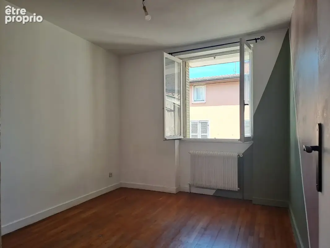 Appartement T3 de 61m2 dans le centre de Couzon ! - photo 2