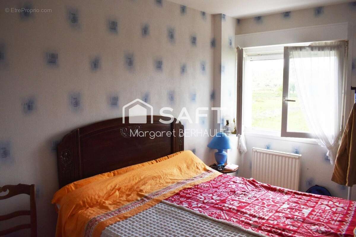 Photo 9 - Maison à URVILLE-NACQUEVILLE