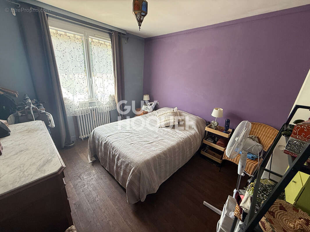 Maison située à Veneux Les SablonS 5 pièce(s) 131 m2 avec 4 chambres dans un quartier calme et à proximité de la gare SNCF - photo 13