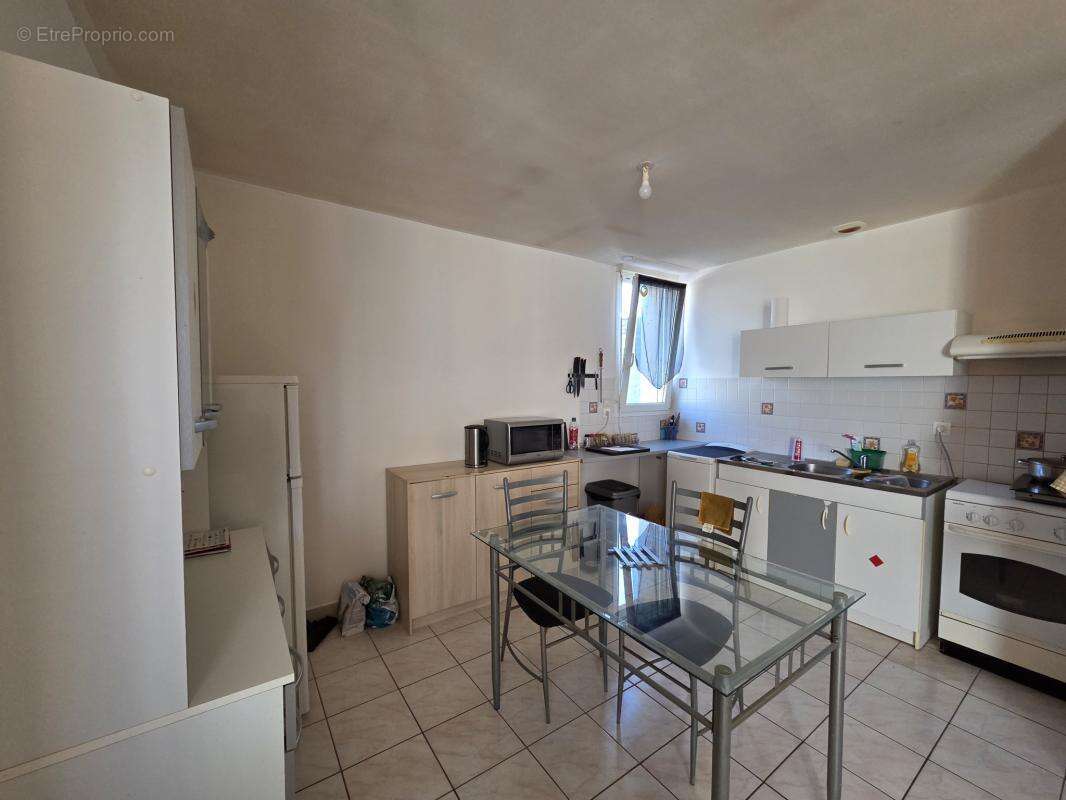 Ensemble immobilier 3 logements-parking- centre bourg neulli - photo 17