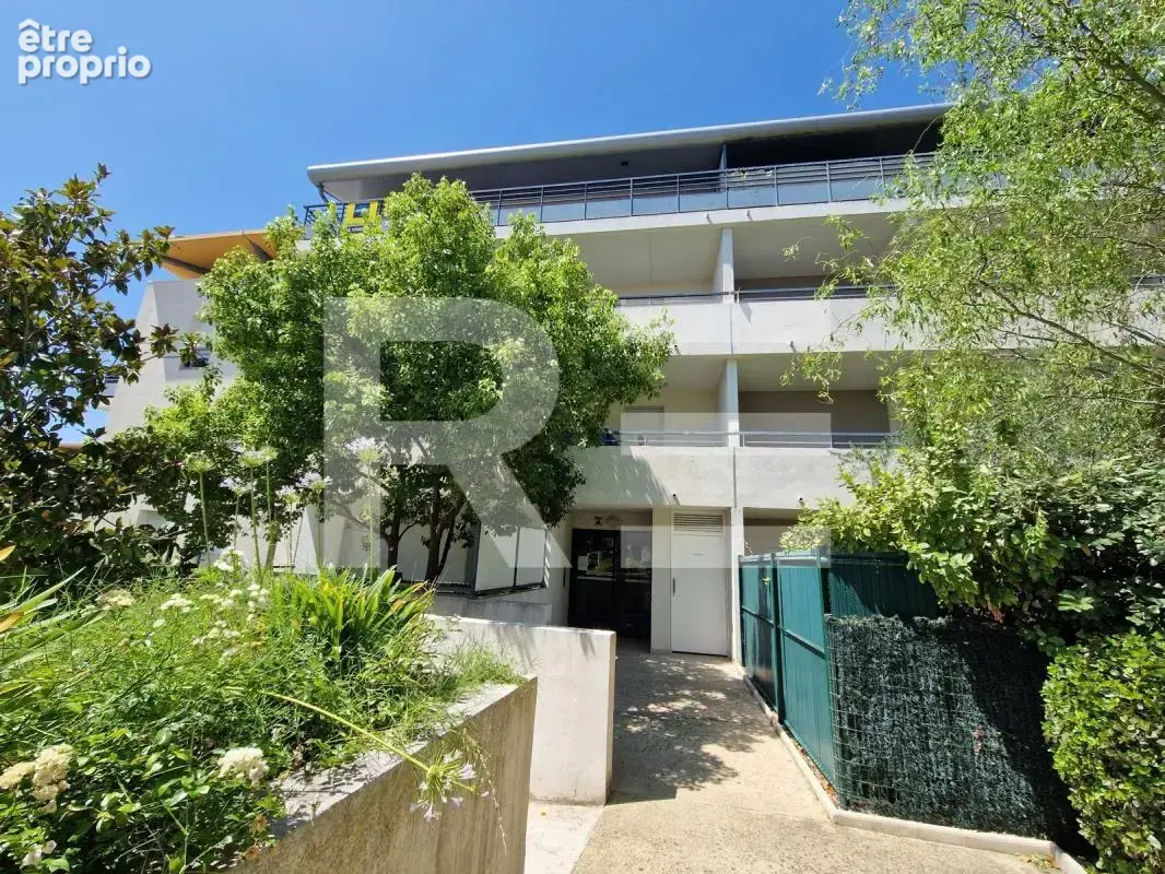 Nimes appartement 63 m² avec 2 chambres terrasse de 18 m² et garage - photo 8