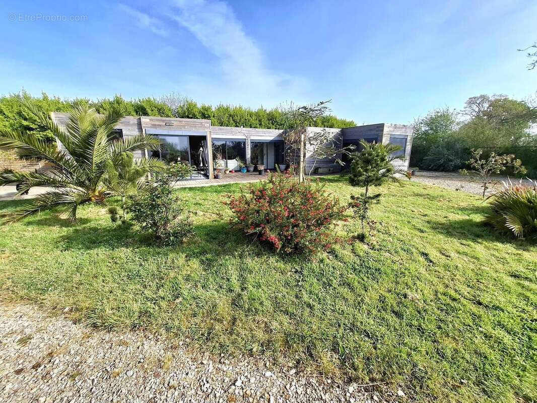 Photo 2 - Maison à RAUVILLE-LA-PLACE