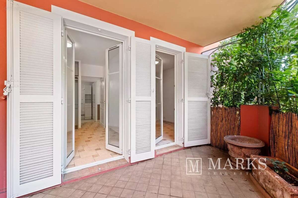 Appartement de 2 chambres avec terrasse, jardin et garage - photo 17