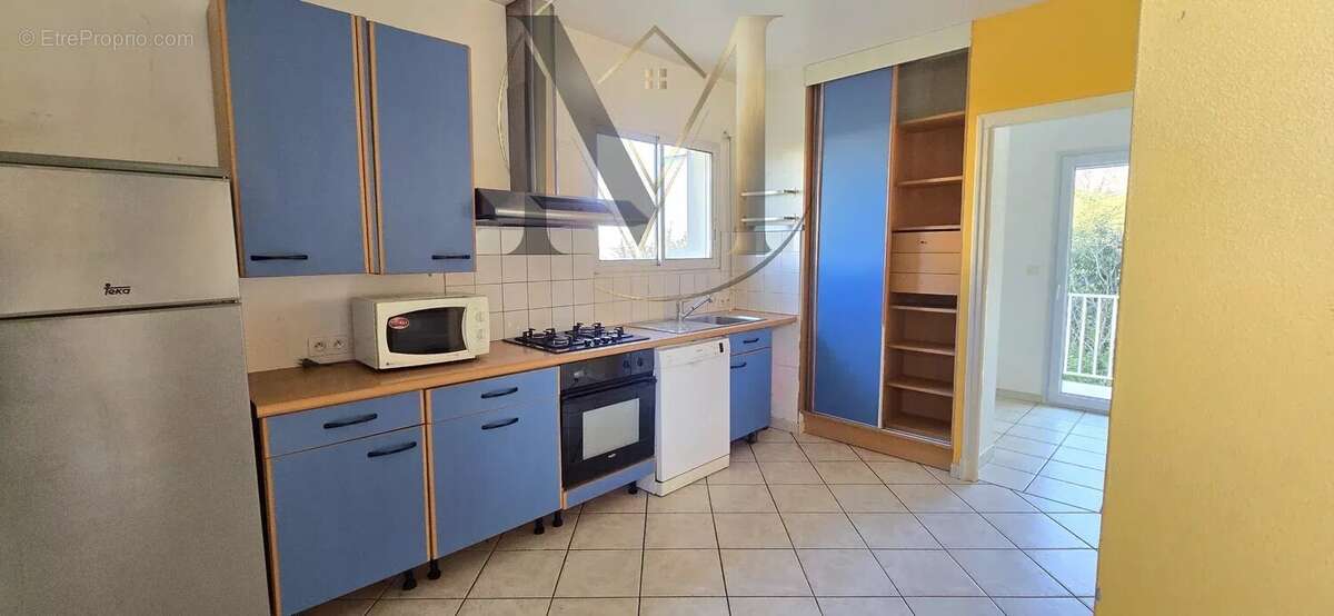 Maison à BUROS