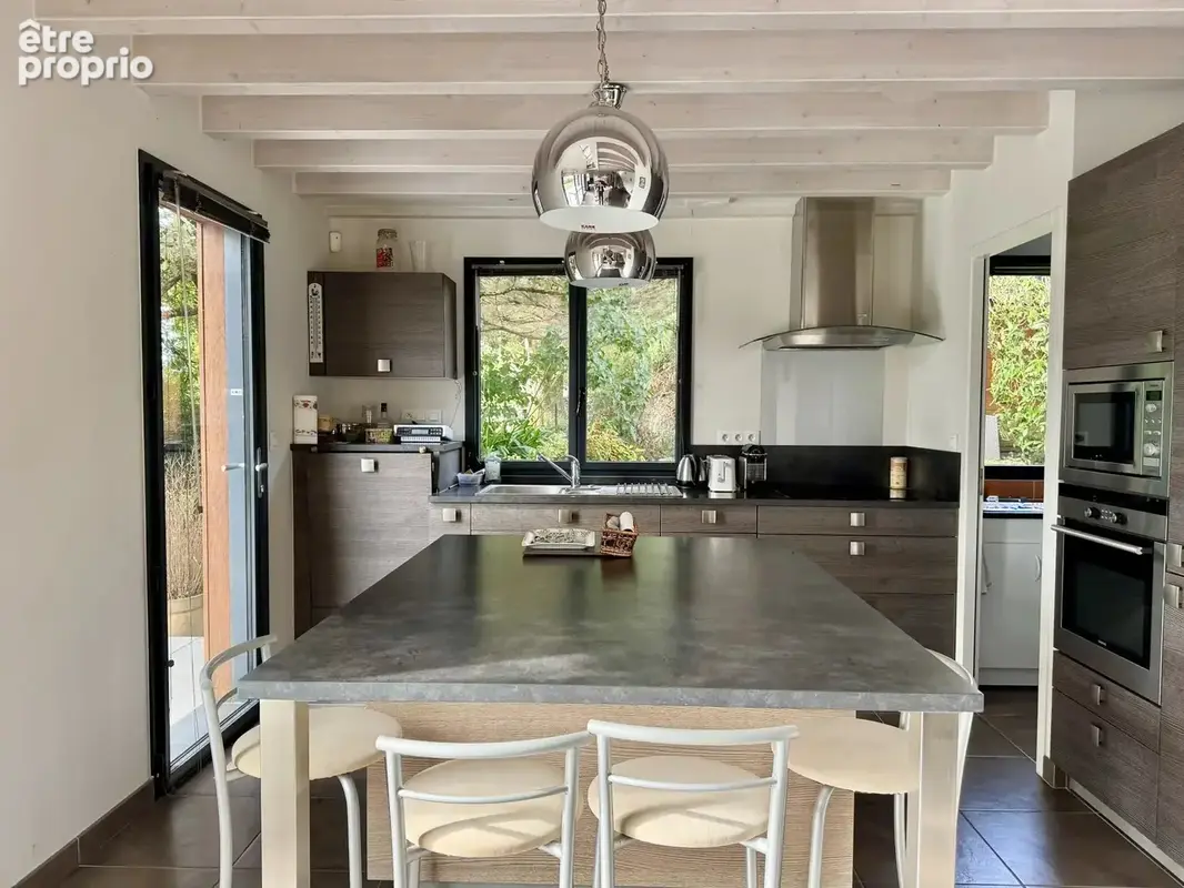 Maison d'architecte - 129 m2 - 6 pièces - photo 8