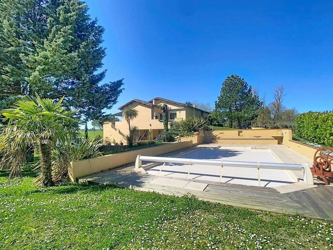 Photo 1 - Maison à CASTELNAU-BARBARENS