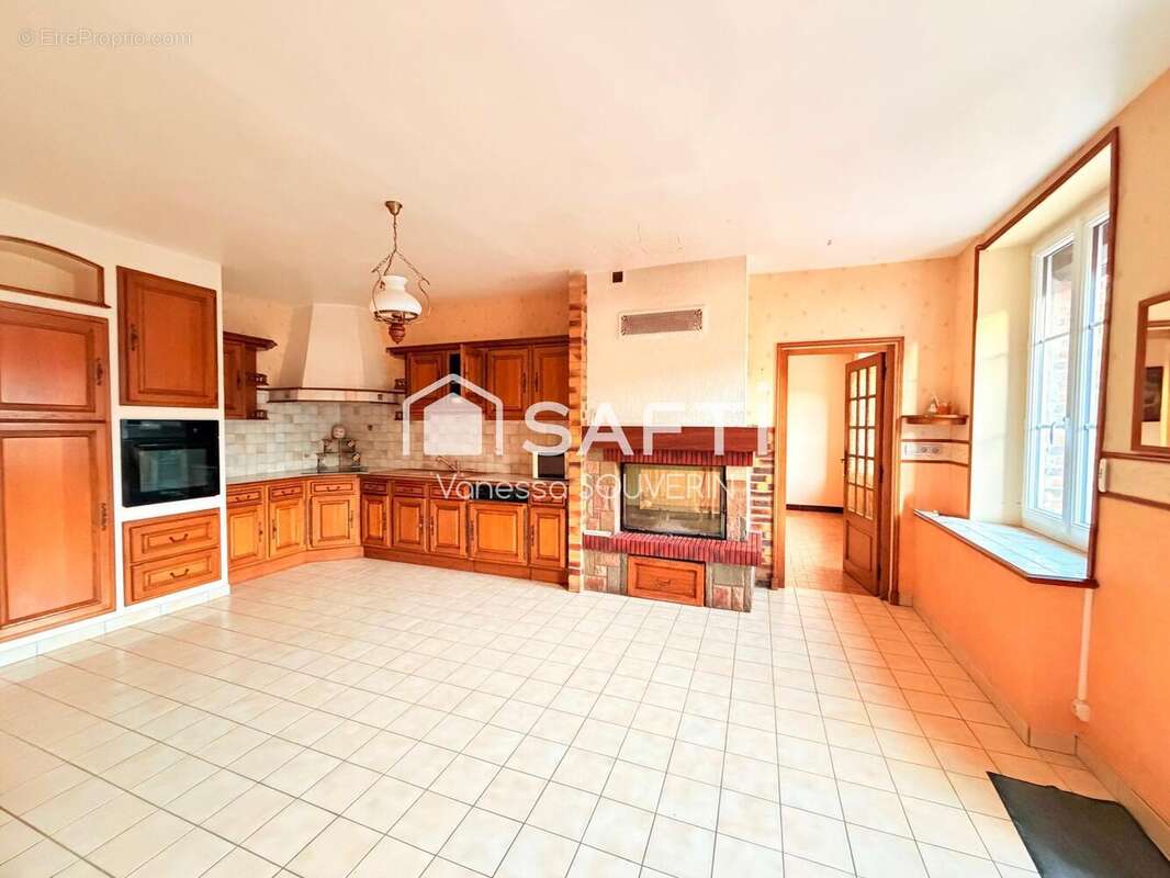 Photo 3 - Maison à LA LOUPTIERE-THENARD