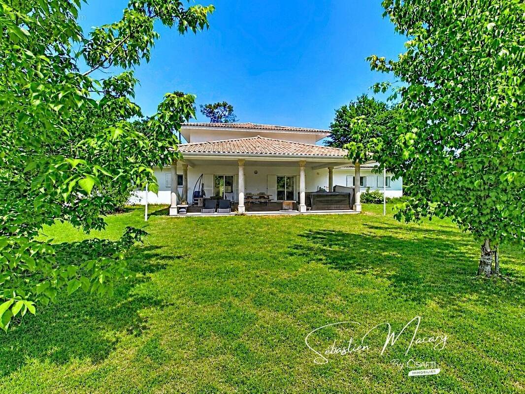 Photo 1 - Maison à LE TAILLAN-MEDOC