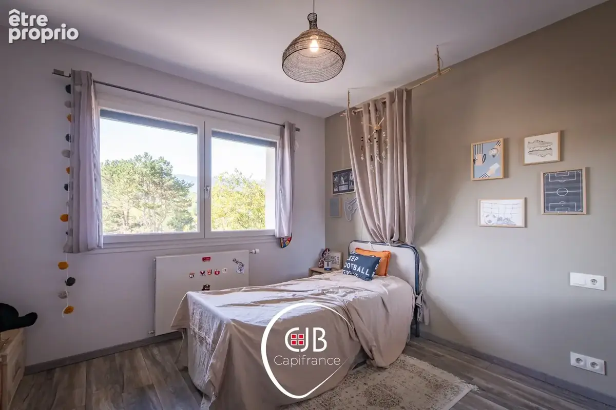 Sonnaz – Maison 220 m², DPE B et appartement en rez-de-jardin - photo 32