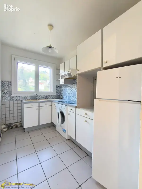 Haut de Thiers, appartement type F3 de 52m2 au RDC avec balcon et une cave. - photo 2