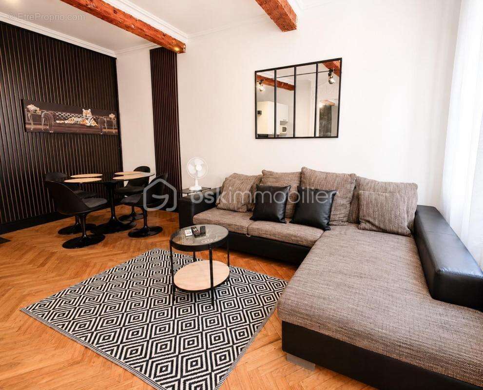 Investissement locatif- un local commercial- 2 appartements- 1 studio - 1 cave- entièrement meublé - photo 11