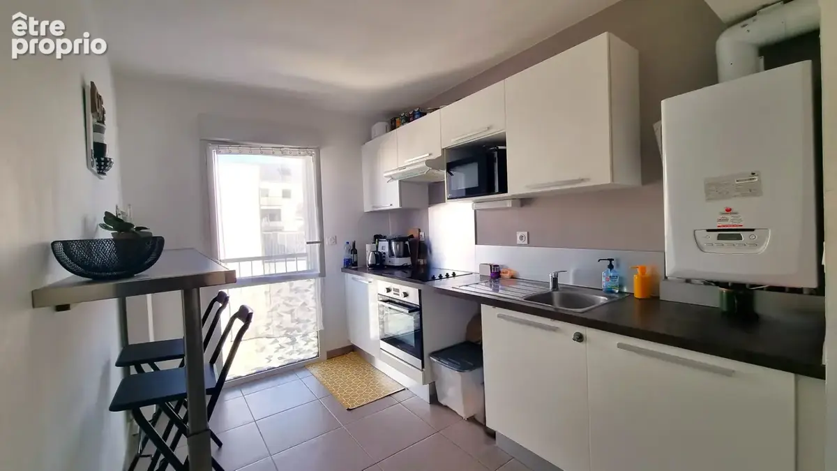SAUTRON Bourg- Beau T3 lumineux de 67m² avec terrasse et 2 stationnements sécurisés - photo 4