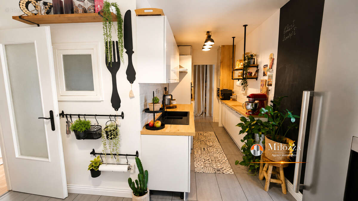 Appartement familial 113 m² avec 4 chambres, balcon, cave et garage - Villefontaine - photo 8