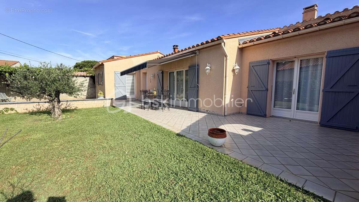 Maison plain pied quatres faces avec terrain et garage - photo 2