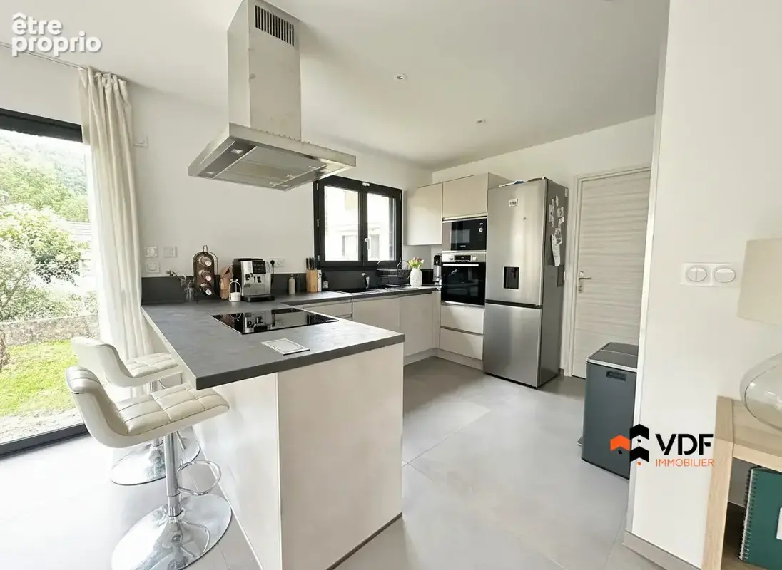 Maison 5 pièces 92 m² à vendre à Nivolas-Vermelle (38300) - photo 4