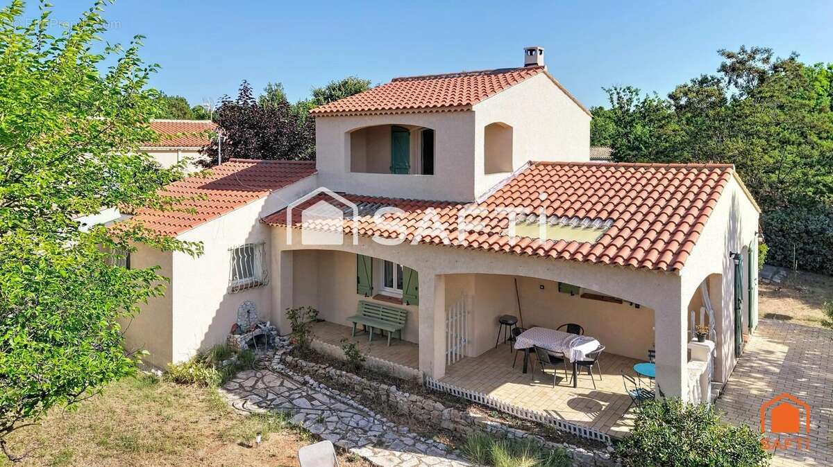 Photo 2 - Maison à REGUSSE