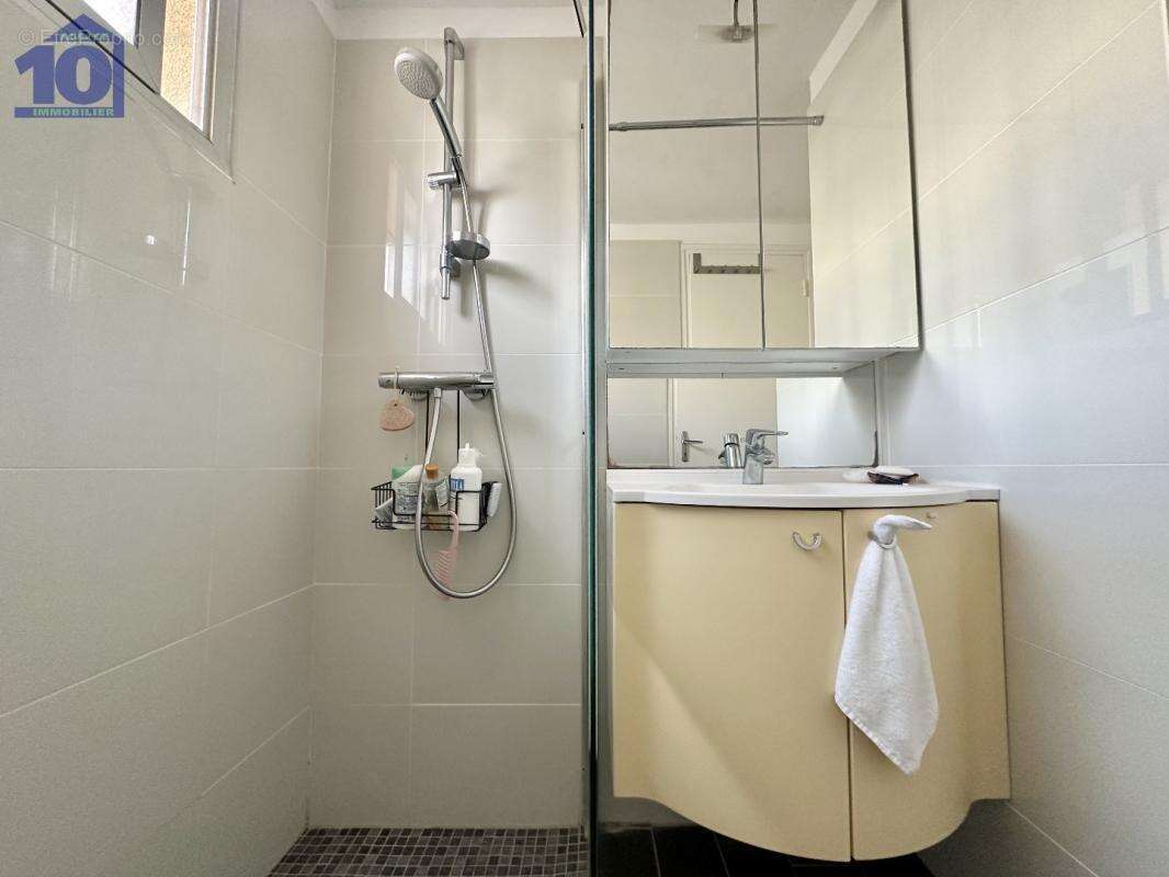 Appartement en rez-de-jardin - photo 9