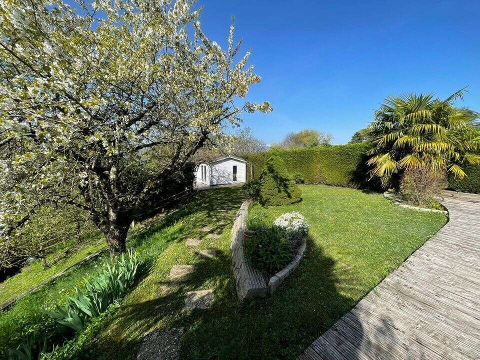 Maison 125 m² à Cranves-Sales  - photo 85