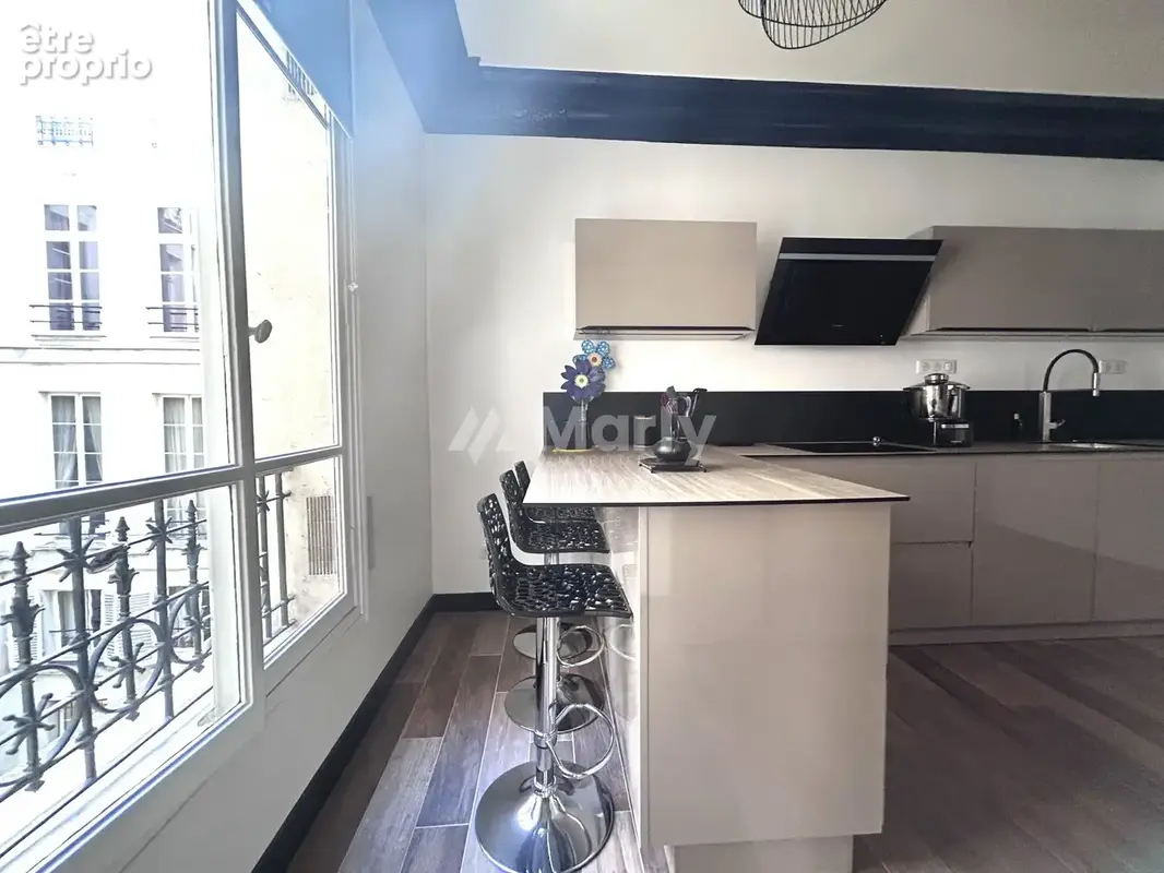 Appartement 3 pièces 95 m² à vendre à Paris-1e (75001) - photo 7