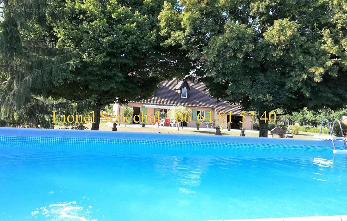 Maison à PARIGNE-L'EVEQUE