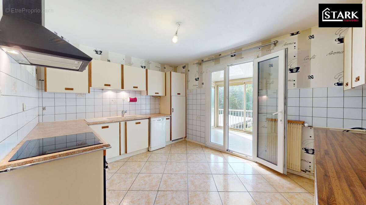 Maison 106 m² à Andelnans  - photo 8