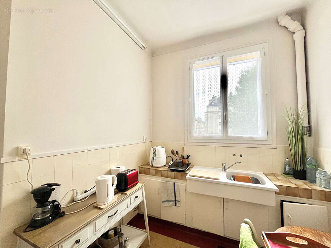A VENDRE appartement loué à Caen 2 pièce(s) 55.18 m2 - Lumineux - quartier prisé - grand salon séjour - photo 11