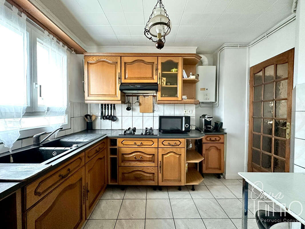 Gratte-Ciel - T4 /T5 de 85m² avec balcon, parking et cave - photo 8