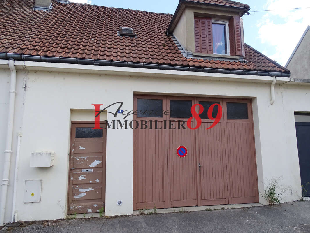 Au coeur de la ville, agréable maison avec double garage, VENDUE LOUÉE - photo 2