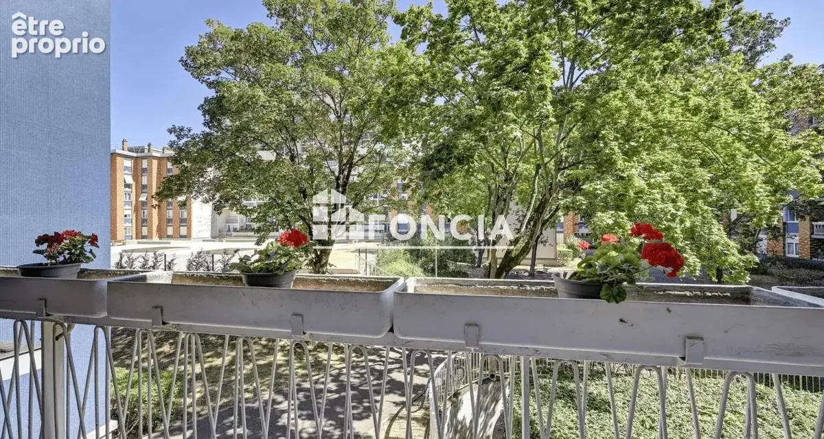 Appartement familial avec balcon ,cave et parking - photo 6