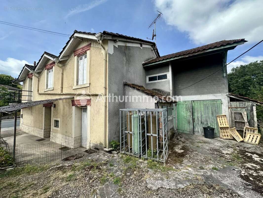 Ensemble immobilier avec local commercial, habitation et garages – Idéal investisseur - photo 3