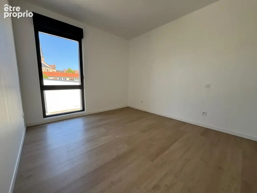 Appartement neuf au 1er étage avec balcon + 2 places de parking privatives. - photo 16
