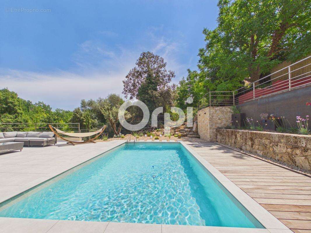 Maison moderne -piscine -vue dégagée - double garage - proche commodités - photo 4