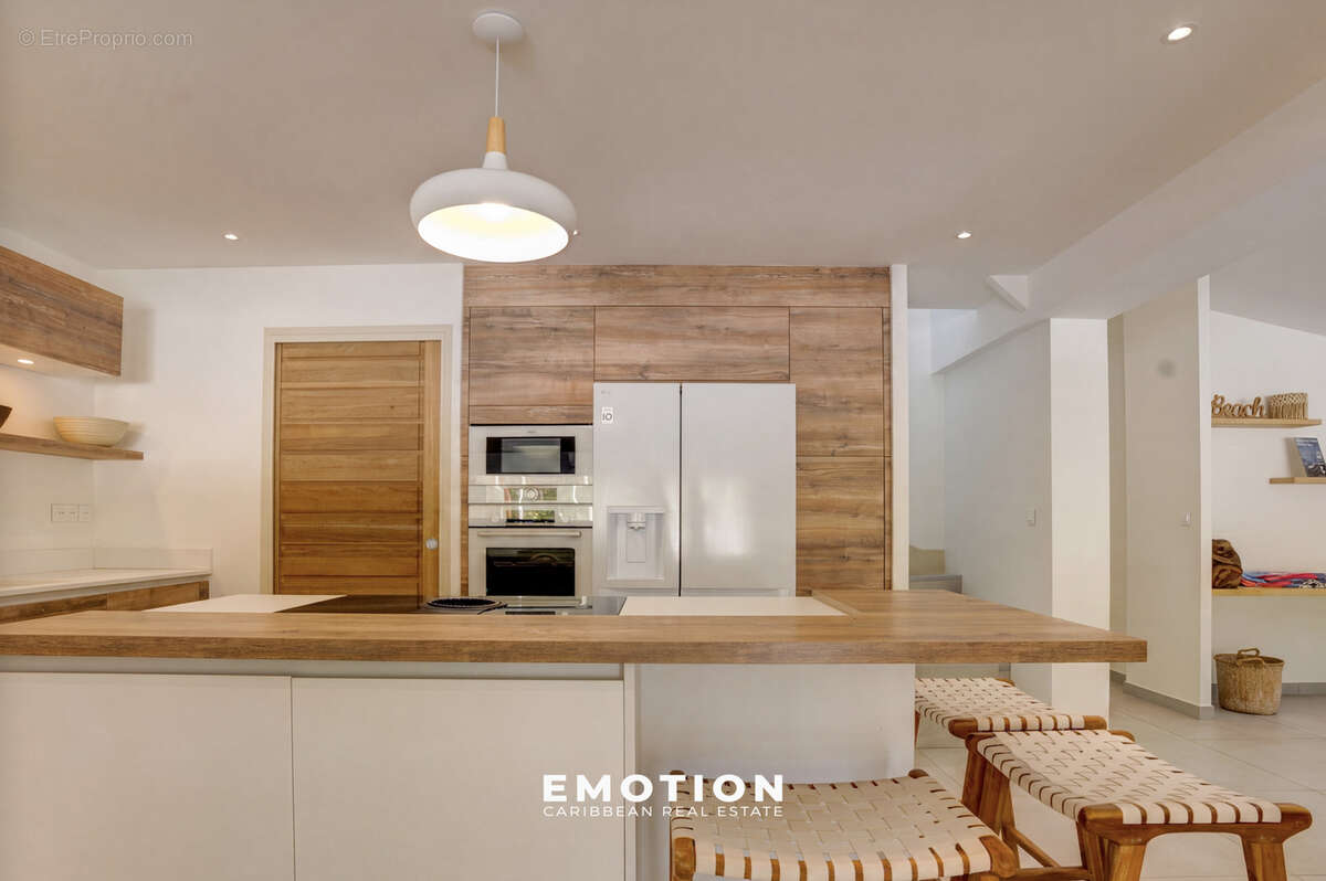 Duplex 140m2 - T3 - Vue marina Anse Marcel - photo 6