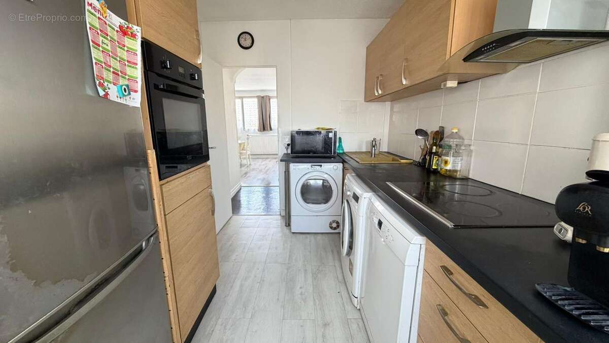 EXCLUSIVITE - F4 (71m²), 27 m² de séjour, Cave et Box - photo 2