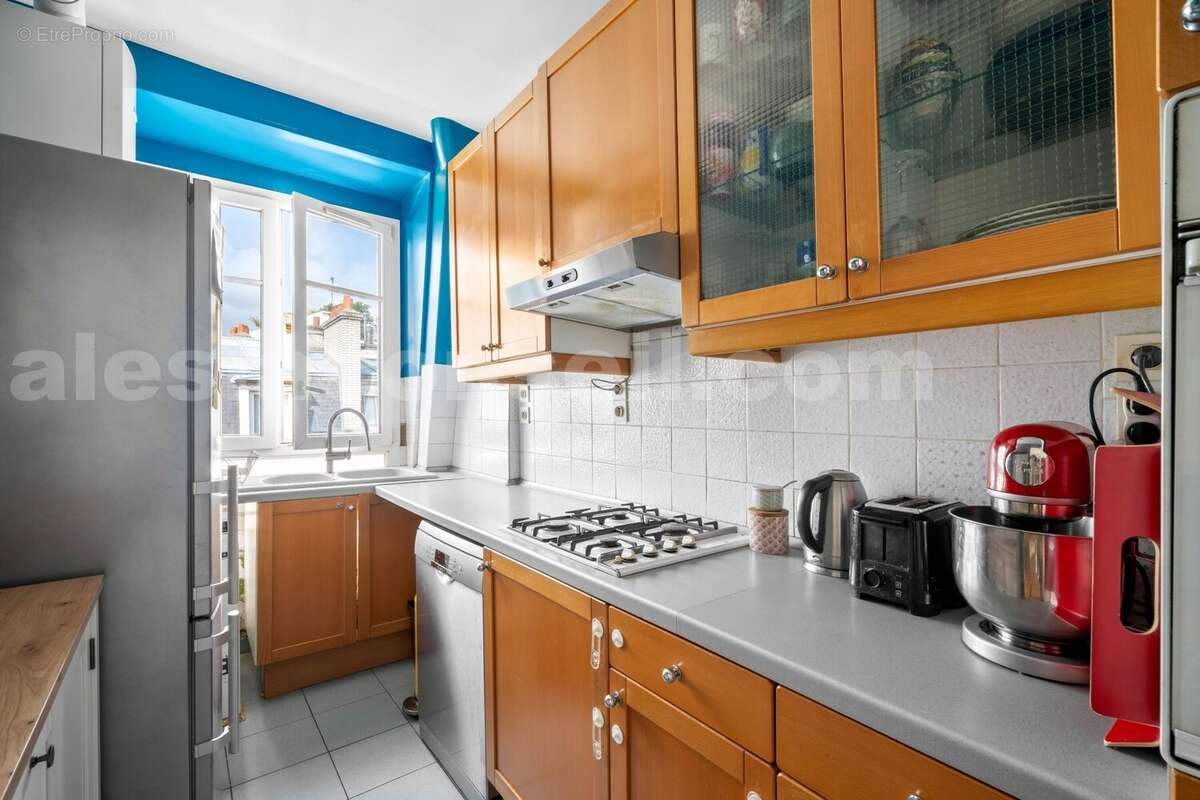 Photo n°2 - Appartement à PARIS-14E
