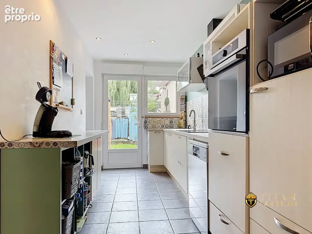 Maison mitoyenne de 71 m² habitables  2 chambres - Jardin exposé sud  Cave - Dunkerque (59640) - TITAN IMMOBILIER 