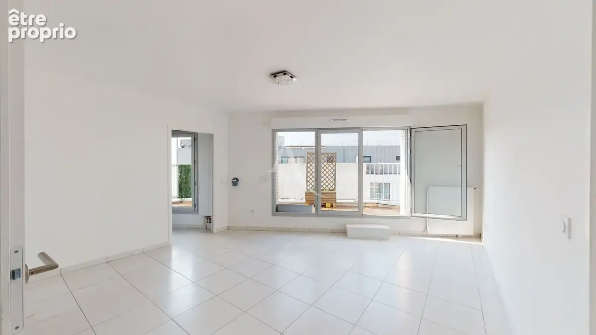 Appartement Asnières Sur Seine 3 pièces 63.44 m2 avec terrasse, cave et parking. - photo 2