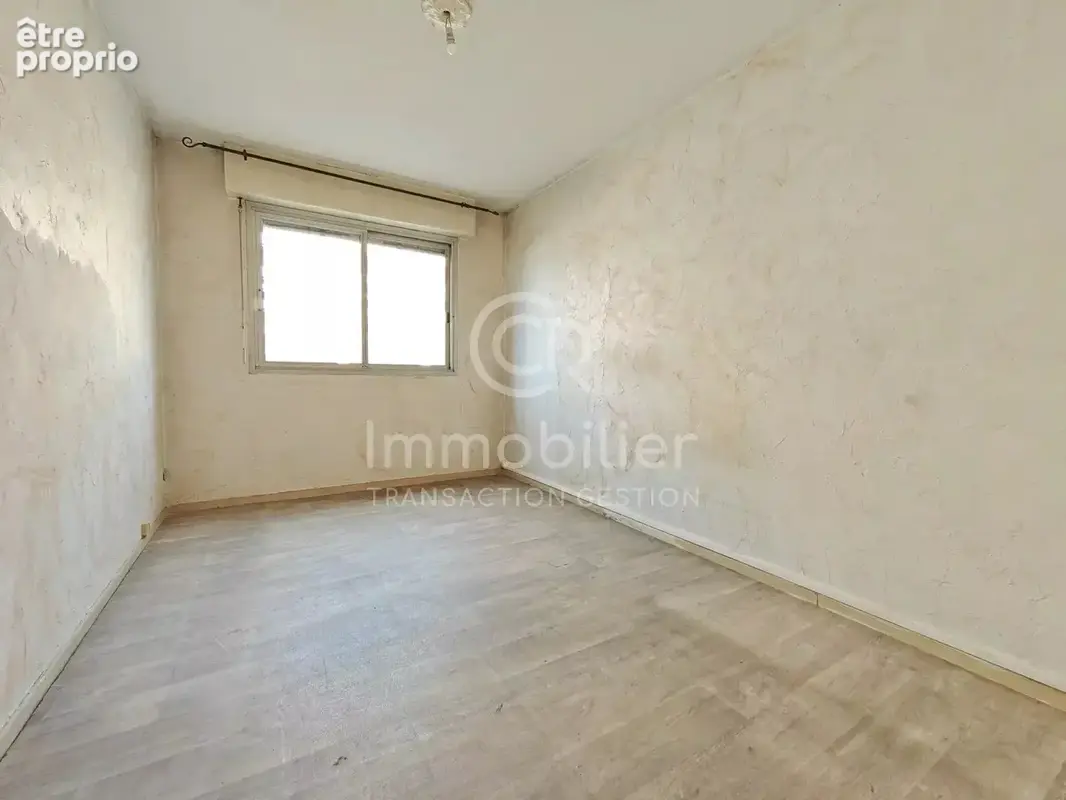 T3 traversant sud-nord 62m² rez-de-jardin - photo 9