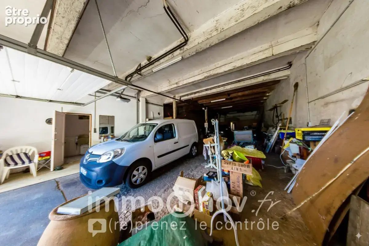 EXCLUSIVITE - Ensemble immobilier à rénover avec maison, appartement et garage - photo 8
