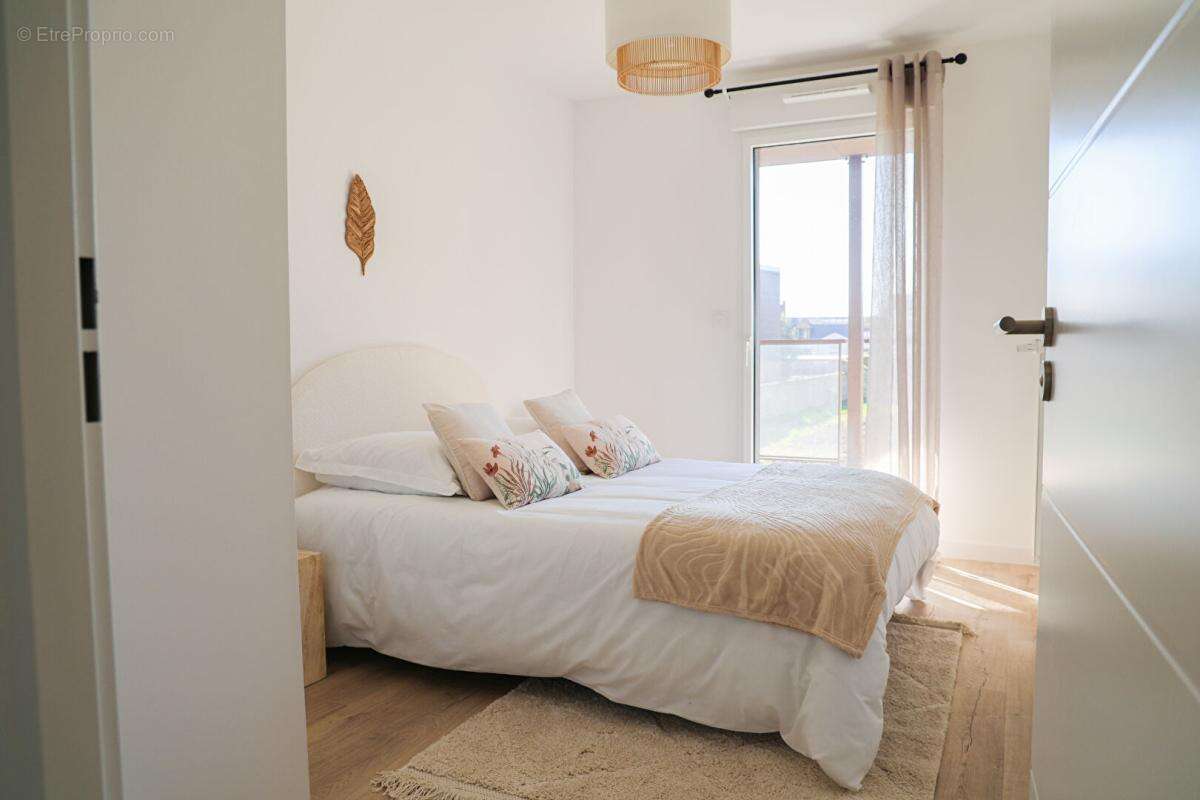 Appartement - Rennes - 3 pièces - 58.8 m2 + Parking + Loggia - Quartier Jeanne d'Arc - photo 5