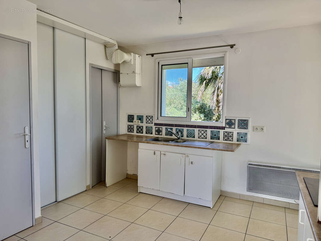 Maison à LAUDUN-L&#039;ARDOISE