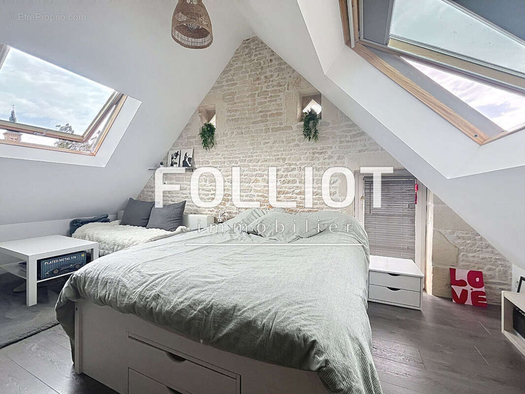 ACHAT/VENTE Maison en pierre de 4 pièces à vendre à Thaon -  Beau terrain clos - photo 4