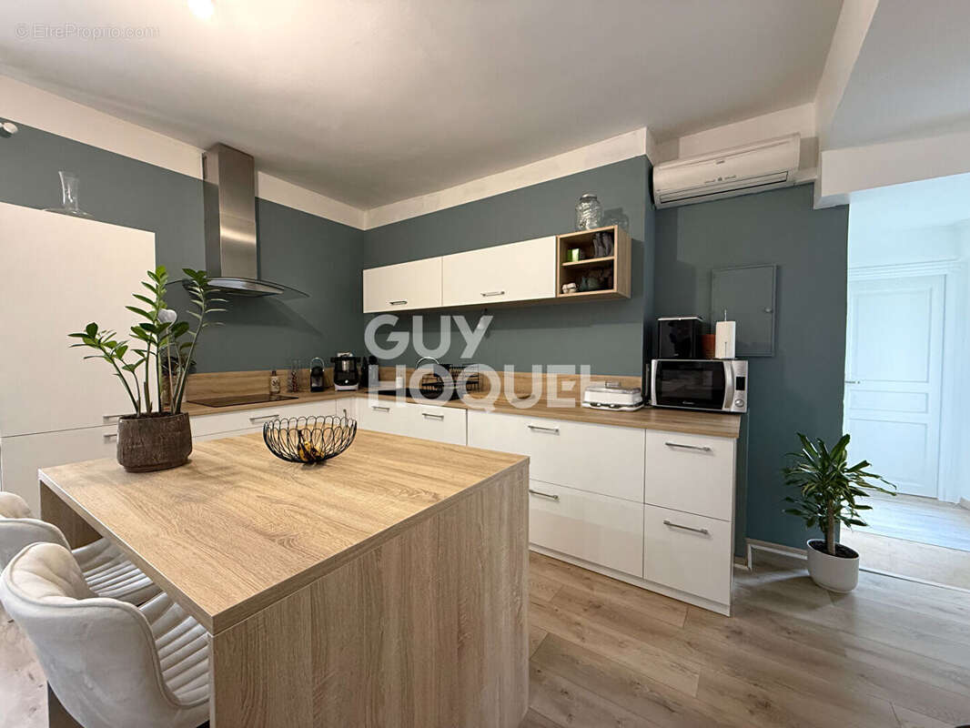 Appartement T2 Bis possibilité T3 au centre  d'Echalas de 73.27 m2 - photo 6