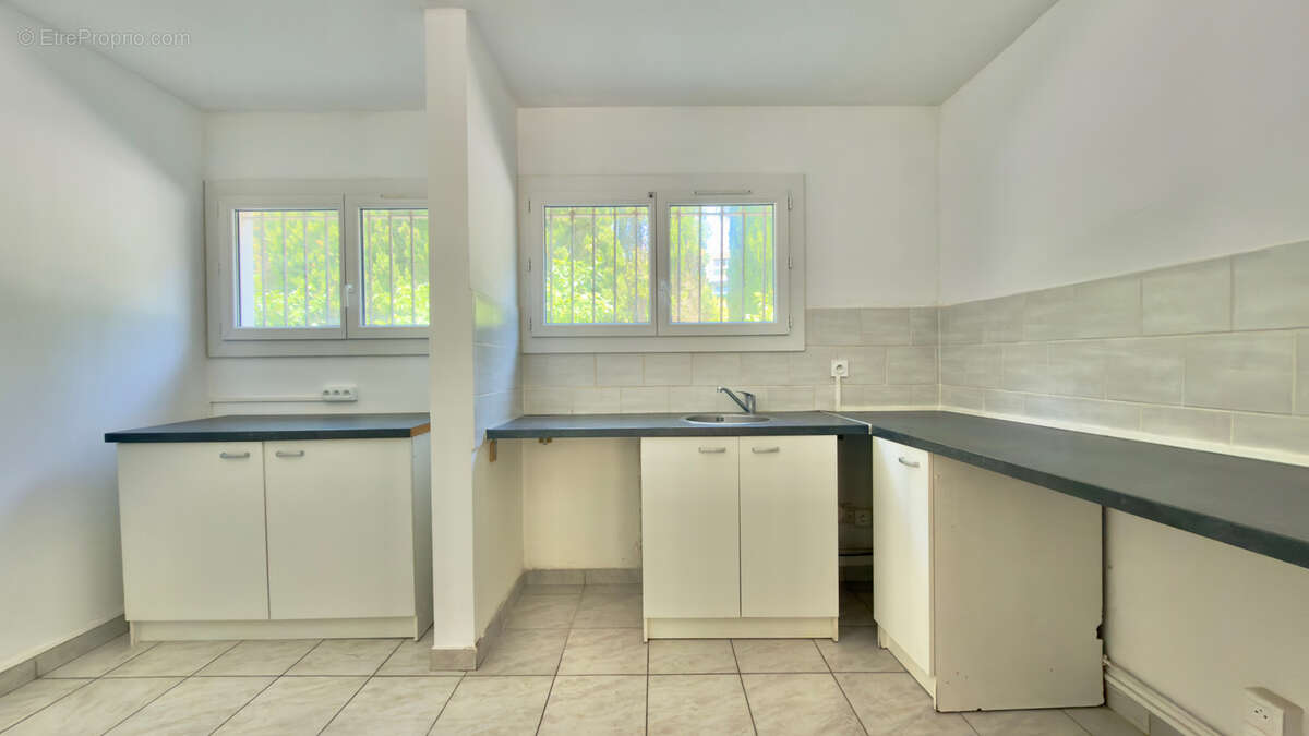 Rez de jardin - T3 - Parking - Olbius riquier - photo 6