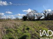 Photo 1 - Terrain à CAOUENNEC-LANVEZEAC