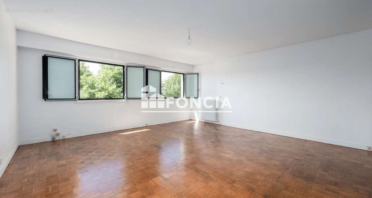Appartement familial - centre-ville - photo 2