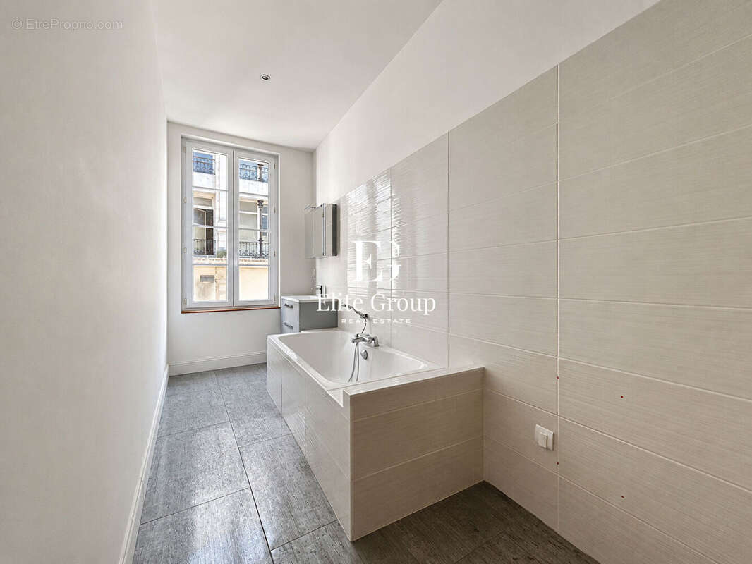 Élégant appartement esprit maison de ville avec terrasse sur les toits - photo 12