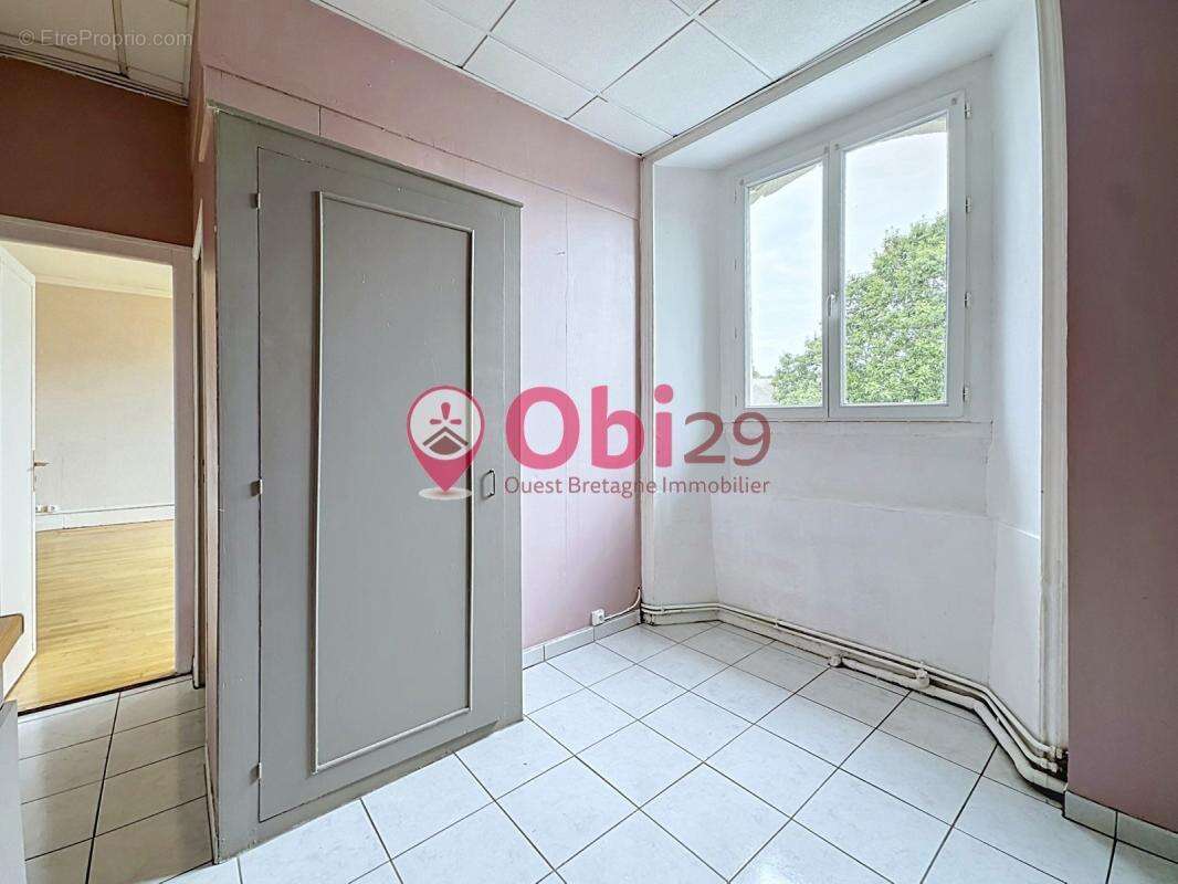Appartement T4 de 100 m² – Centre-ville de Châteaulin - photo 8